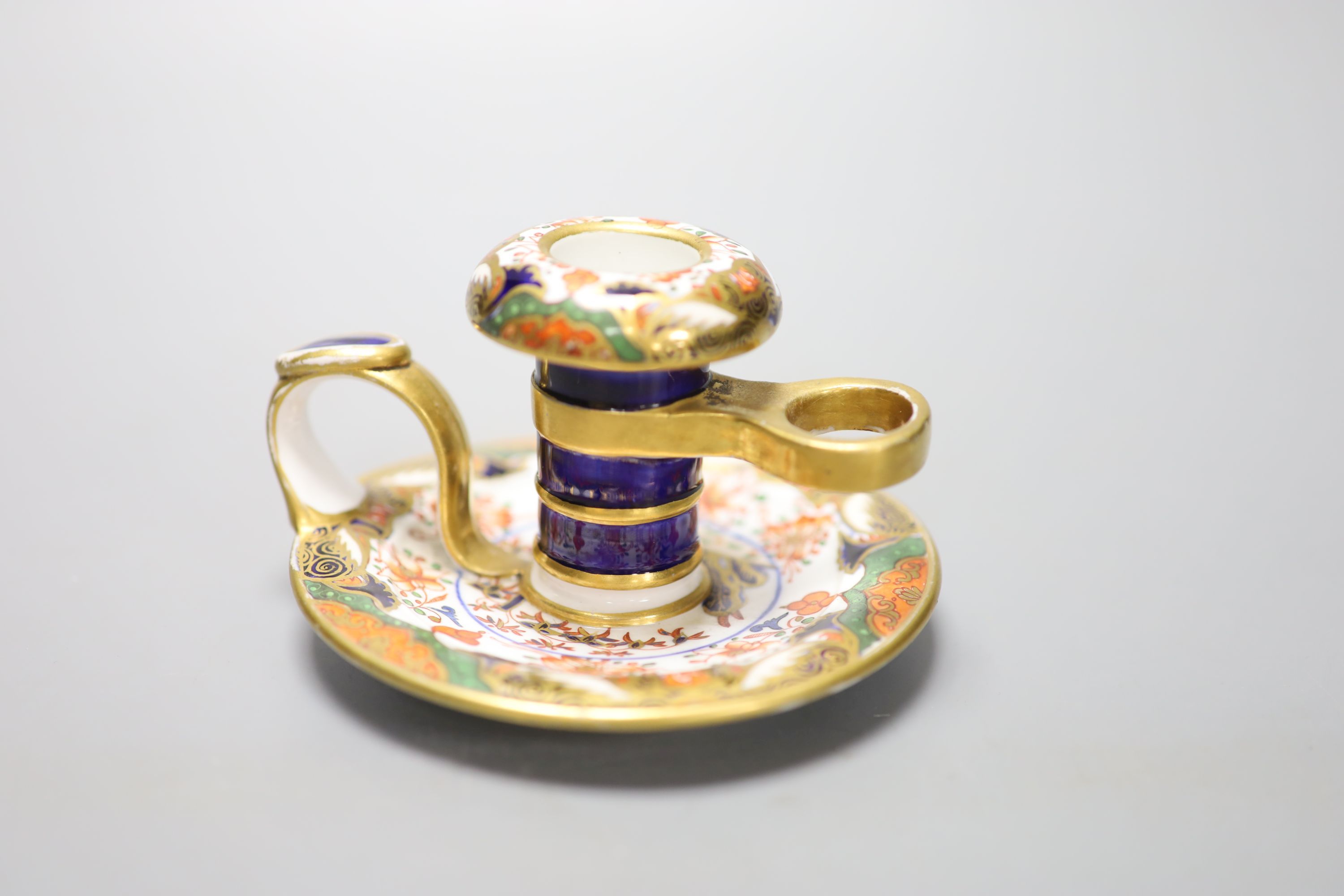 A Spode chamberstick painted with imari pattern 967, Spode mark in red c.1815, height 7cm